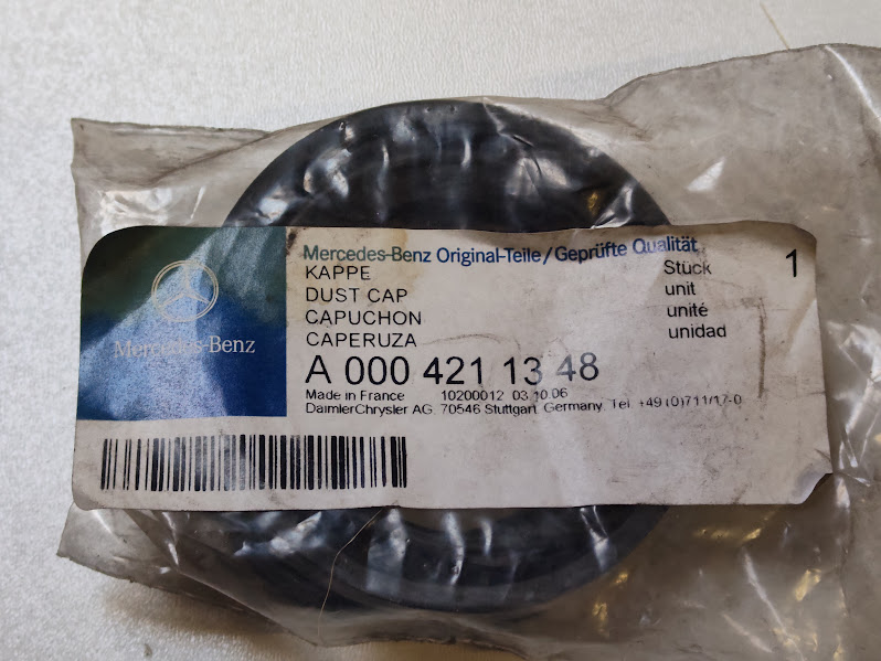 Osłonka tłoczka hamulcowego Mercedes 0004211348